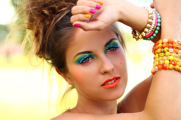 Beautiful woman with artistic makeup