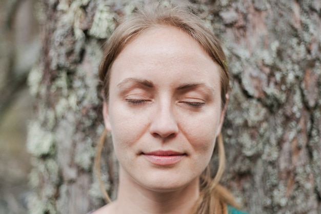 Beautiful woman with closed eyes