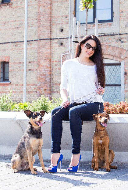 Beautiful woman with dogs