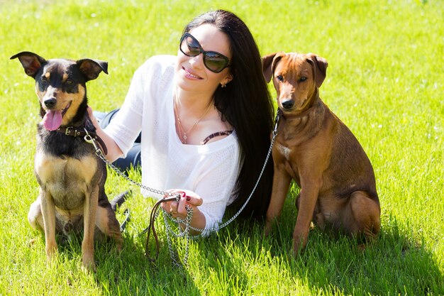 Beautiful woman with dogs