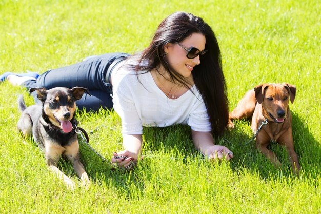 Beautiful woman with dogs