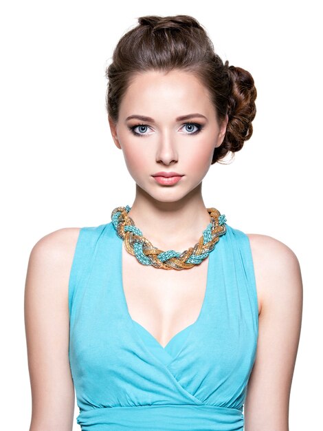 Beautiful woman with evening make-up jewelry and beauty fashion photo