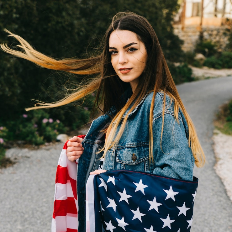 Free Photo beautiful woman with flag