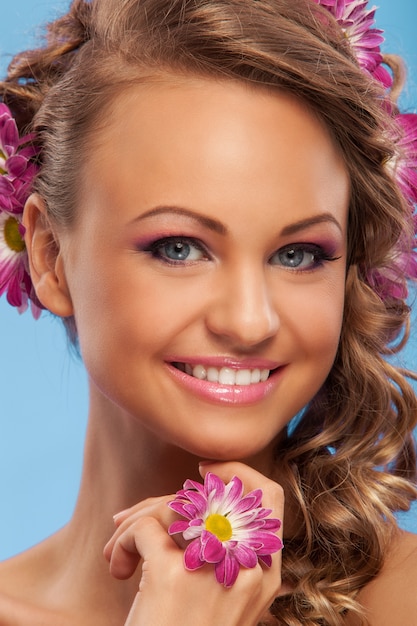 Beautiful woman with flowers in her hair