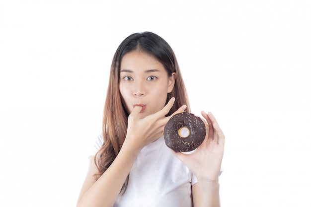 Beautiful woman with a happy smile holding a hand donut, isolated on white background.