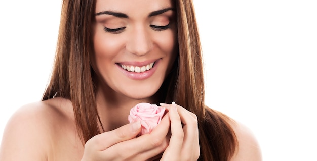 Beautiful woman with pink rose on white background, panoramic view