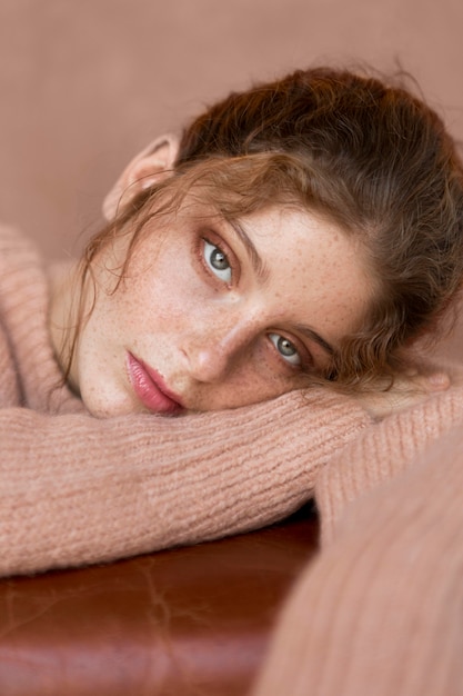 Beautiful woman with pink sweater