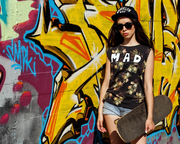 Beautiful woman with skateboard