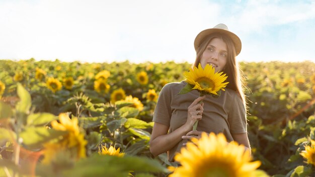 Beautiful woman with sunflower