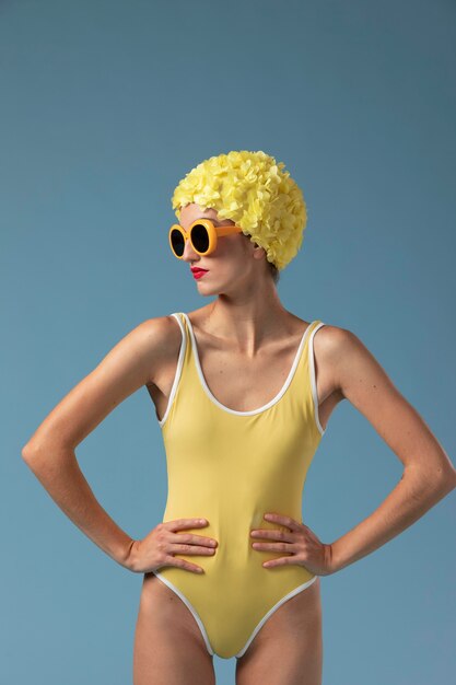 Beautiful woman with swimming cap