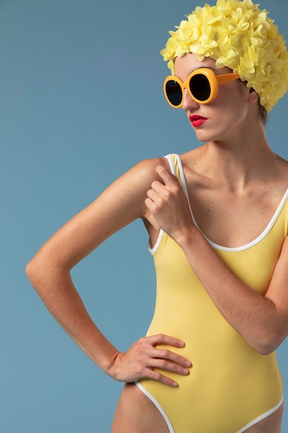 Beautiful woman with swimming cap