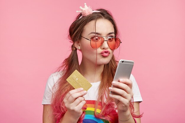 Beautiful woman with trendy pink sunglasses