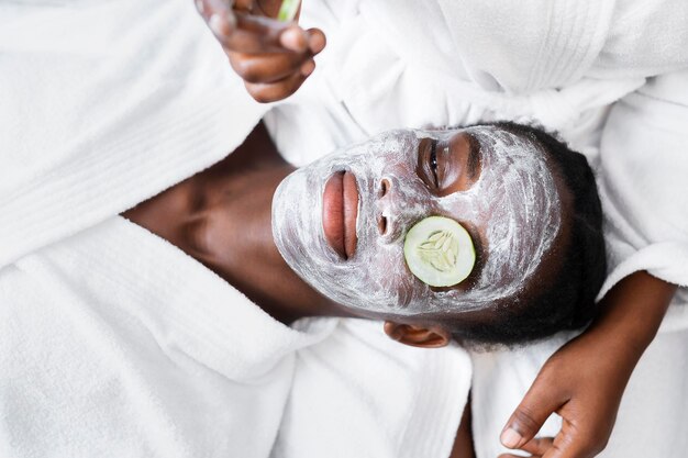 Beautiful women doing a self care treatment at home