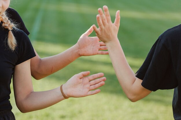 Beautiful women hands high five