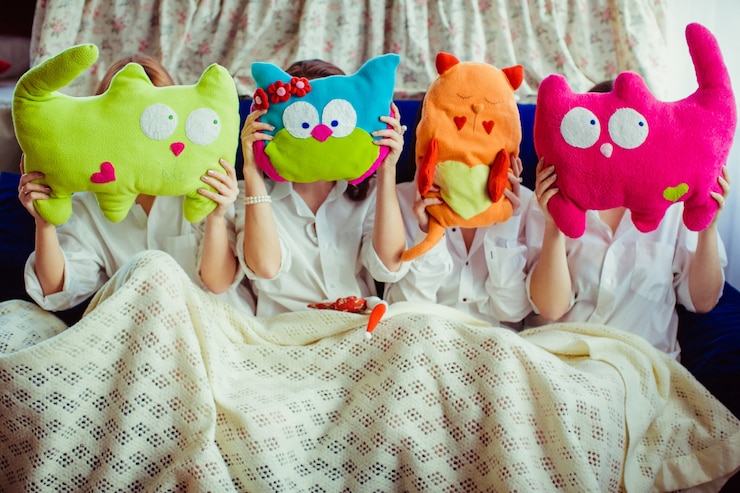 Free Photo beautiful women holding funny cute toys