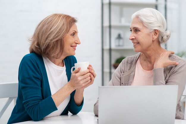 Beautiful women talking to each other