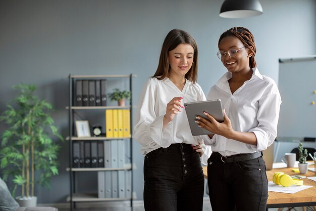 Beautiful women working together in a startup company