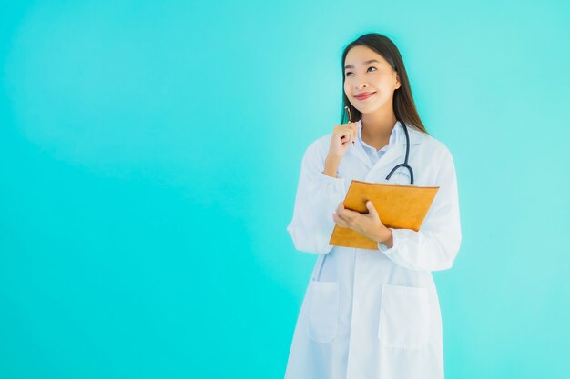  beautiful young asian doctor woman with empty card board