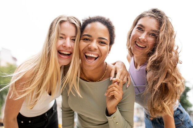 Beautiful young friends laughing