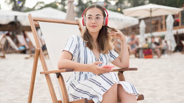 Beautiful young girl relaxing at  the beach