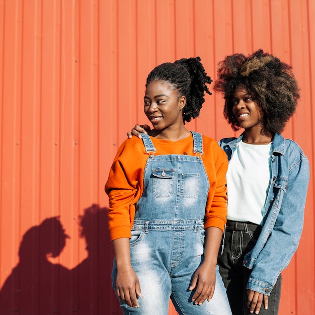 Beautiful young girls looking away