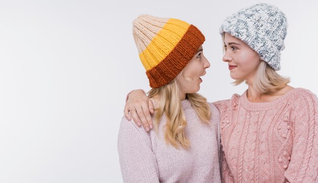 Beautiful young girls looking at each other