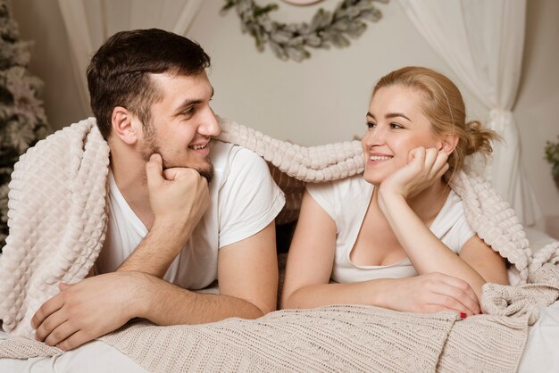 Beautiful young man and woman smiling