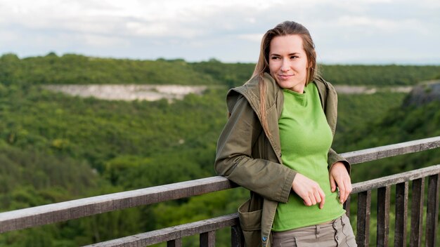 Beautiful young traveler relaxing outdoors