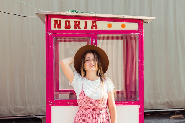 Beautiful young woman in the amusement park