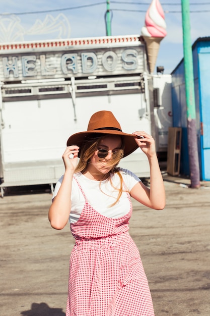 Beautiful young woman in the amusement park