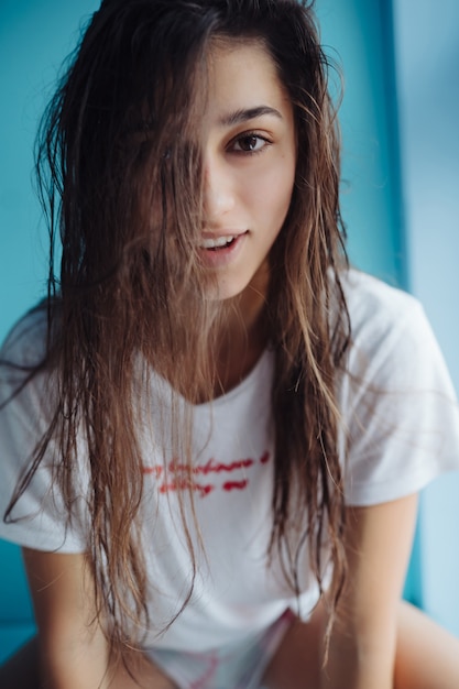 Beautiful young woman in the bathroom.