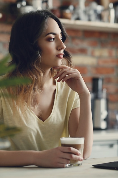 Beautiful young woman at home