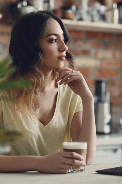 Beautiful young woman at home