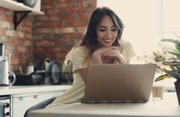 Beautiful young woman at home