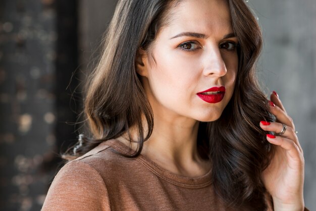 beautiful young woman looking at camera