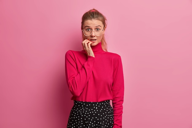 Beautiful young woman portrait wearing glasses isolated