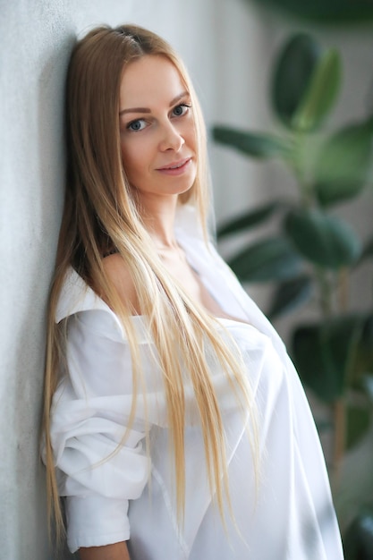 Beautiful young woman posing at home