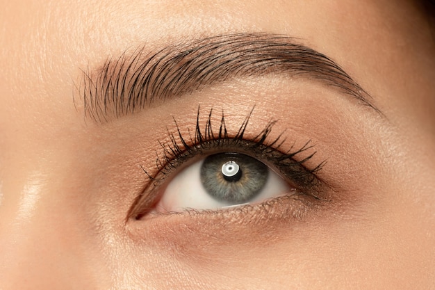 Beautiful young woman's eye close-up shot.