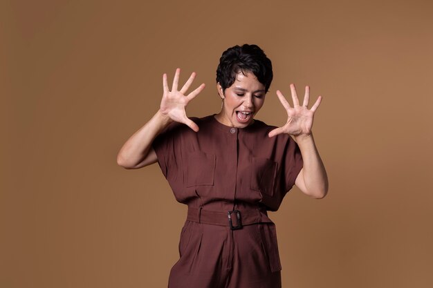 Beautiful young woman shouting portrait