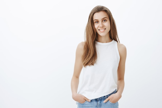 Beautiful young woman smiling broadly