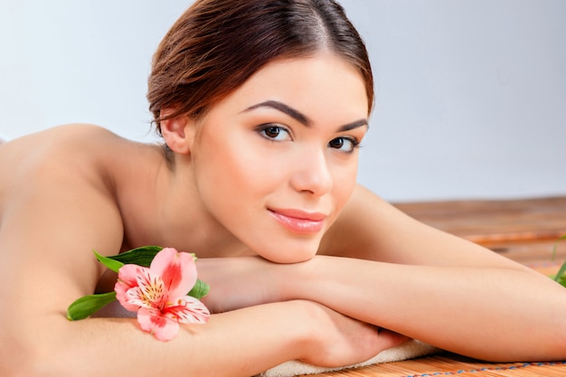 Beautiful young woman at a spa salon