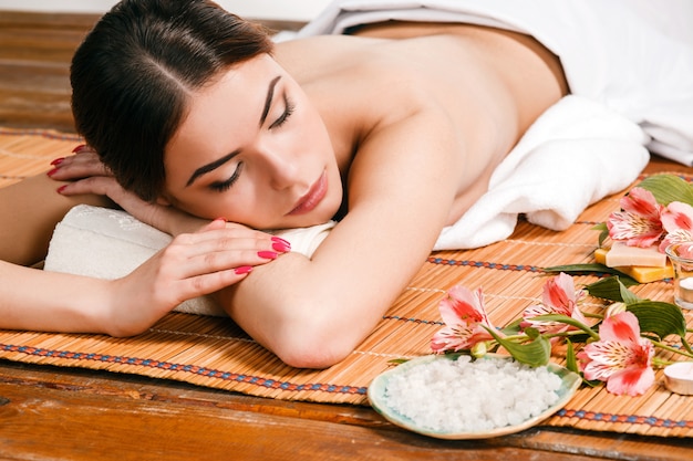 Beautiful young woman at a spa salon