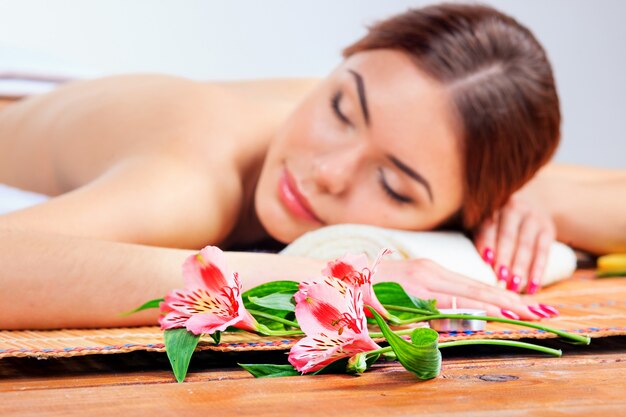 Beautiful young woman at a spa salon