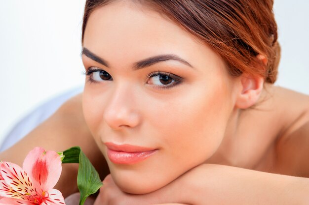 Beautiful young woman at a spa salon