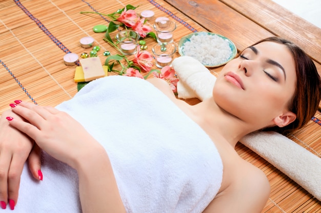 Beautiful young woman at a spa salon