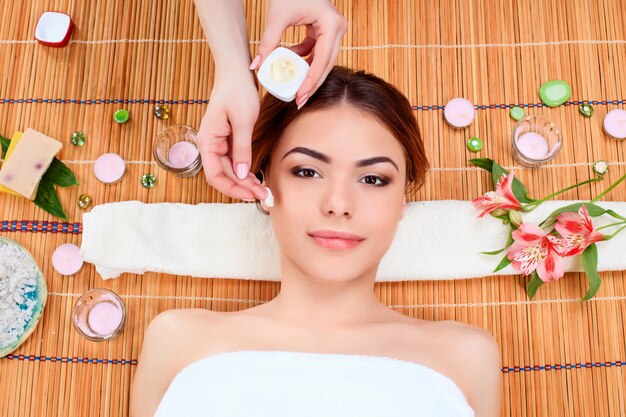 Beautiful young woman at a spa salon