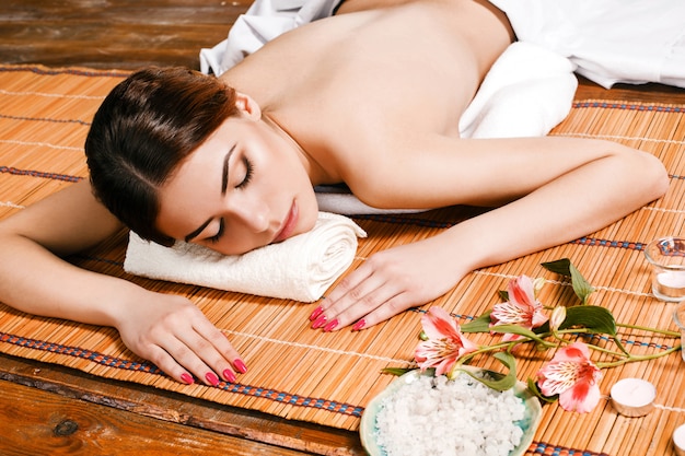 Beautiful young woman at a spa salon