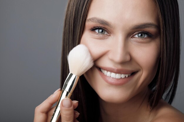 beautiful young woman in studio portrait skin care