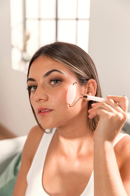 Beautiful young woman trying beauty products