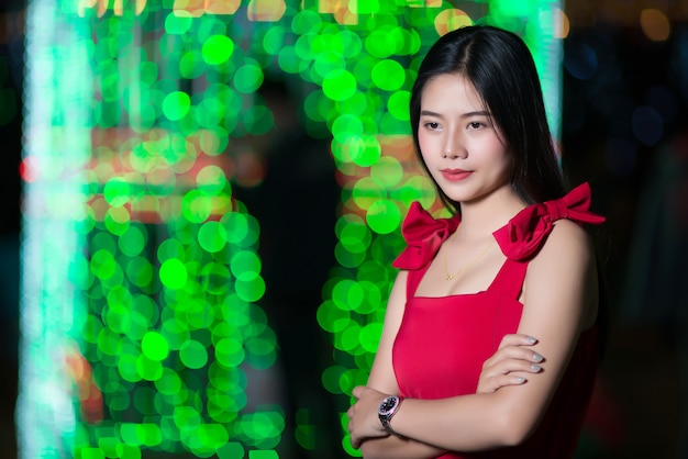 Beautiful young woman walking in the street